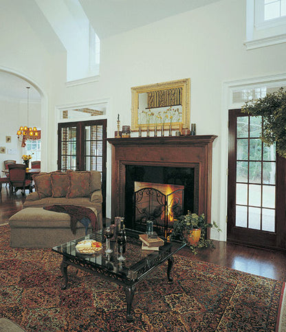 This is a picture of the fireplace in great room of classical house plan 868 The Santerini