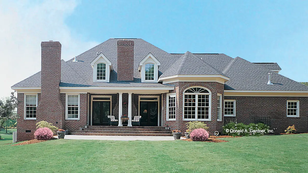 This is a photograph of the rear of brick house plan 868 The Santerini as built by a customer