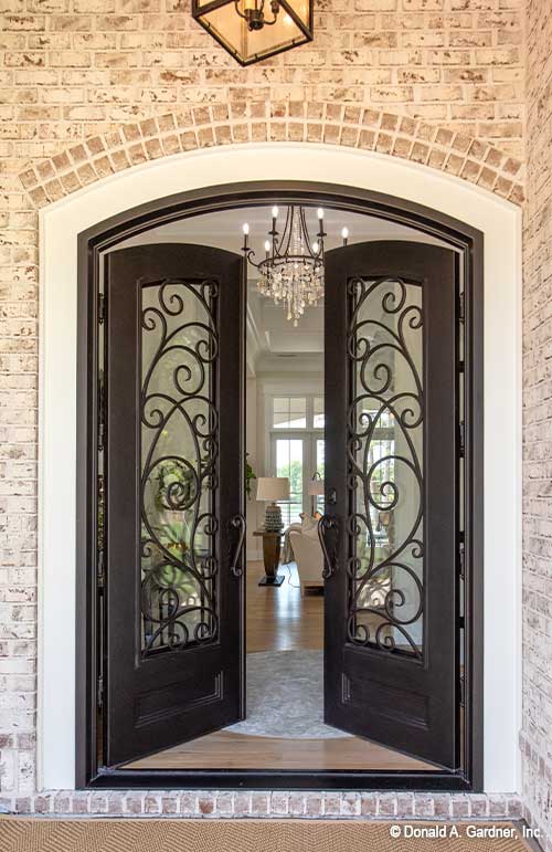 The foyer makes the first impression for visitors to Luxury house plan 1403 The Sarafine