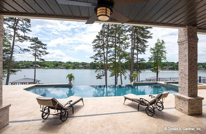 Outdoor living begins with this patio in Executive house plan 1403 The Sarafine