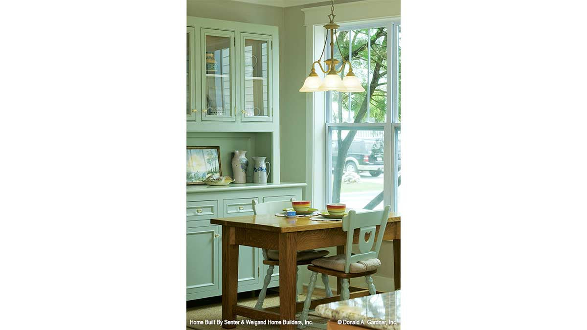 Well-lit breakfast room with windows. The Sassafras plan 814.