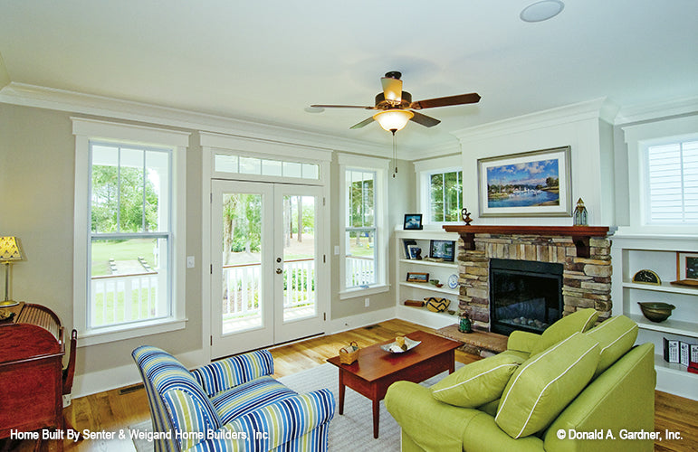 Flat ceiling in the great room with glass patio doors. The Sassafras plan 814.