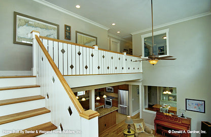 Staircase view to the loft and great room below. The Sassafras plan 814.