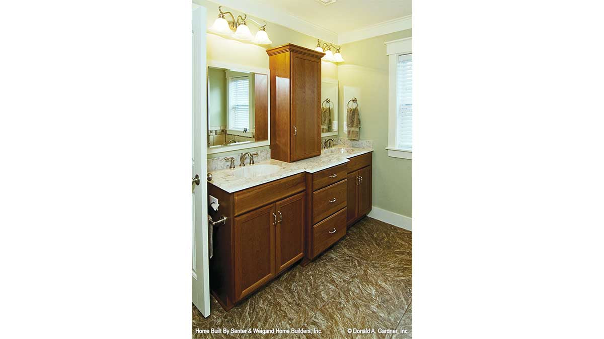 Double sink vanity in the master bathroom. The Sassafras plan 814.