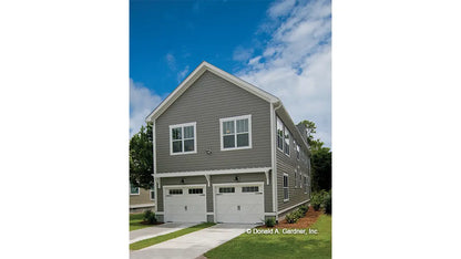 Rear view narrow home with two car garages. The Sassafras plan 814.