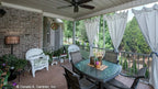 Screened porch is large, welcoming and has great views