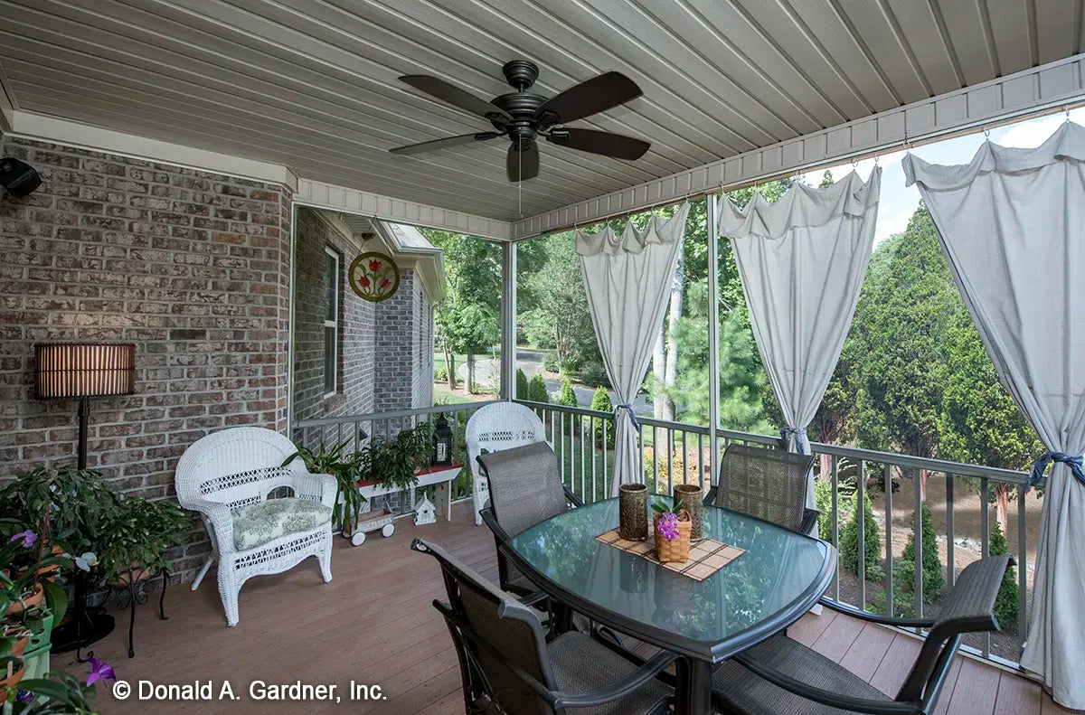 Screened porch is large, welcoming and has great views