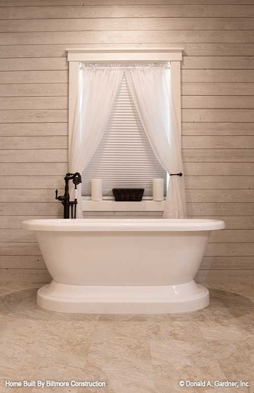 Window behind the soaking tub. The Simon plan 1351.