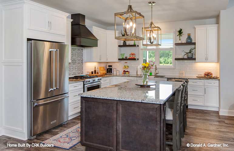 Elegand kitchen with island seating. Sloan plan 1528