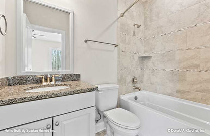 This is a bathroom and tub picture of walkout basement house plan 1143 The Somersby