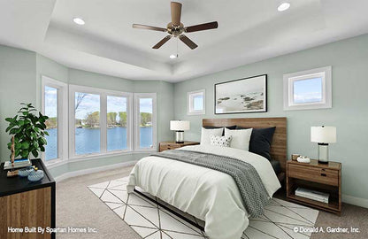 This is a master bedroom picture with tray ceiling of walkout basement house plan 1143 The Somersby