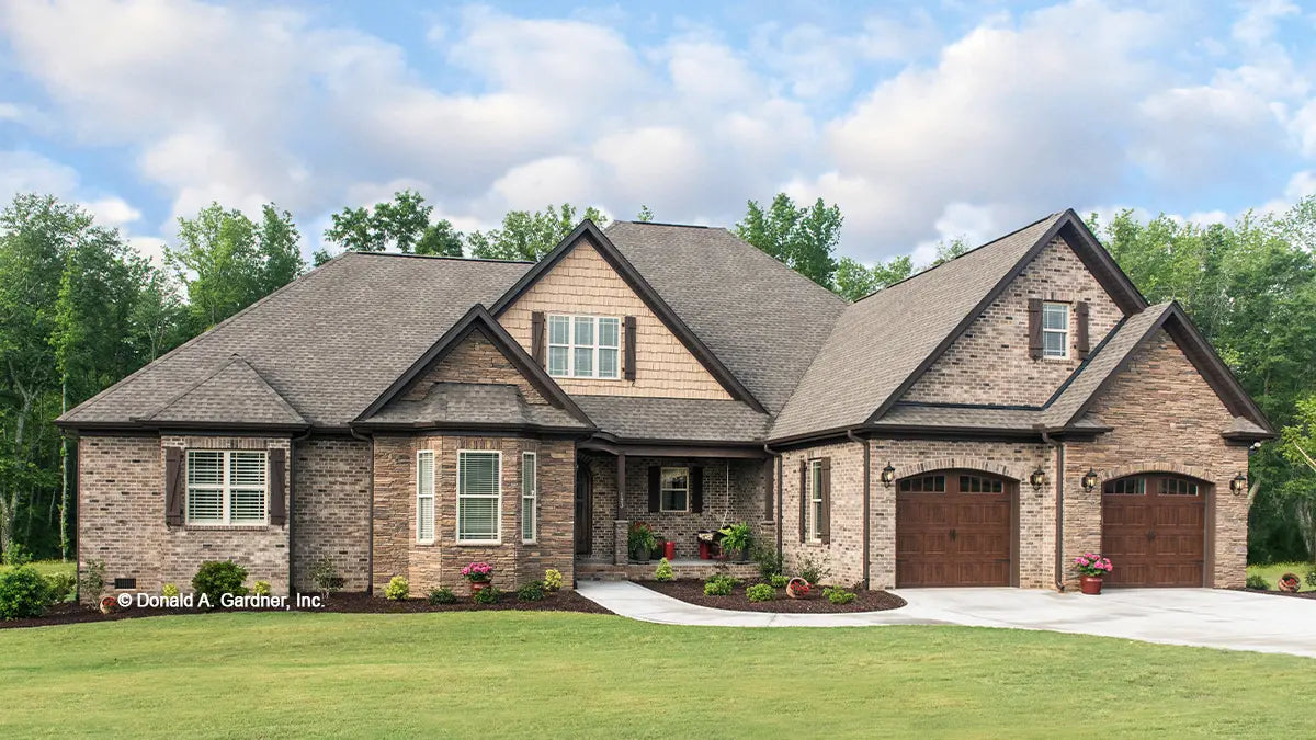 This is a photograph of the front of four bedroom house plan 1310 The Spotswood as built by a customer