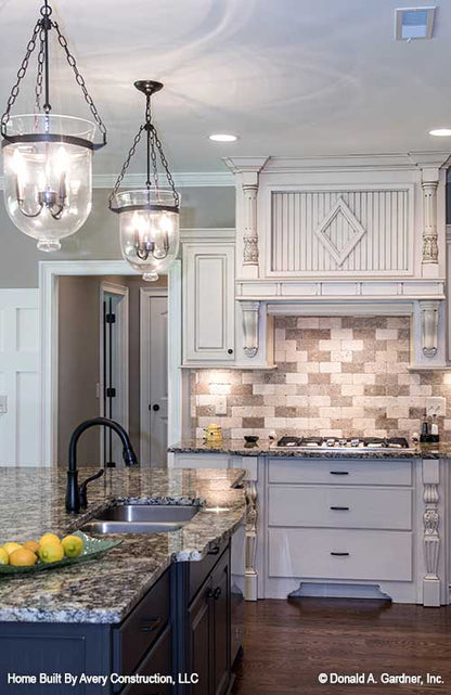 Kitchen picture with island sink for house plan 1310 The Spotswood