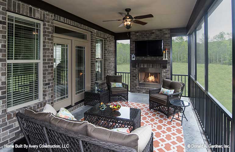 Rear porch fireplace shown in picture for house plan 1310 The Spotswood