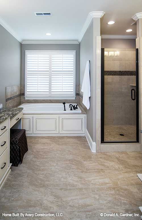 Master bathroom picture showing shower and tub for house plan 1310 The Spotswood