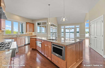 This picture shows the spacious kitchen of luxury house plan 876 The Steeplechase