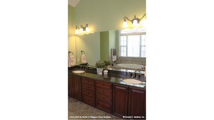 Double sink vanity in the master bathroom. The Summerhill plan 1090.