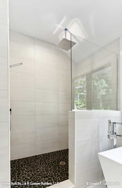 This is the master bathroom shower of contemporary house plan 219 The Sundance