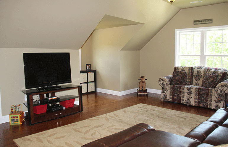 Entertainment space in the bonus room. The Swansboro plan 853.