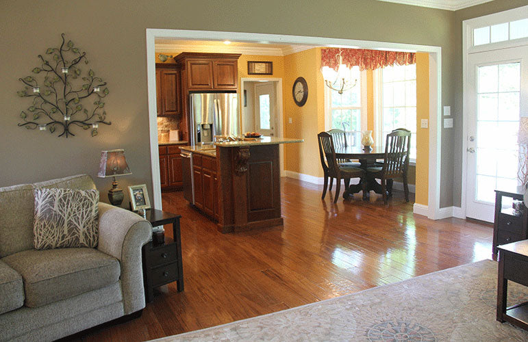 View into the kitchen from the great room. The Swansboro plan 853.