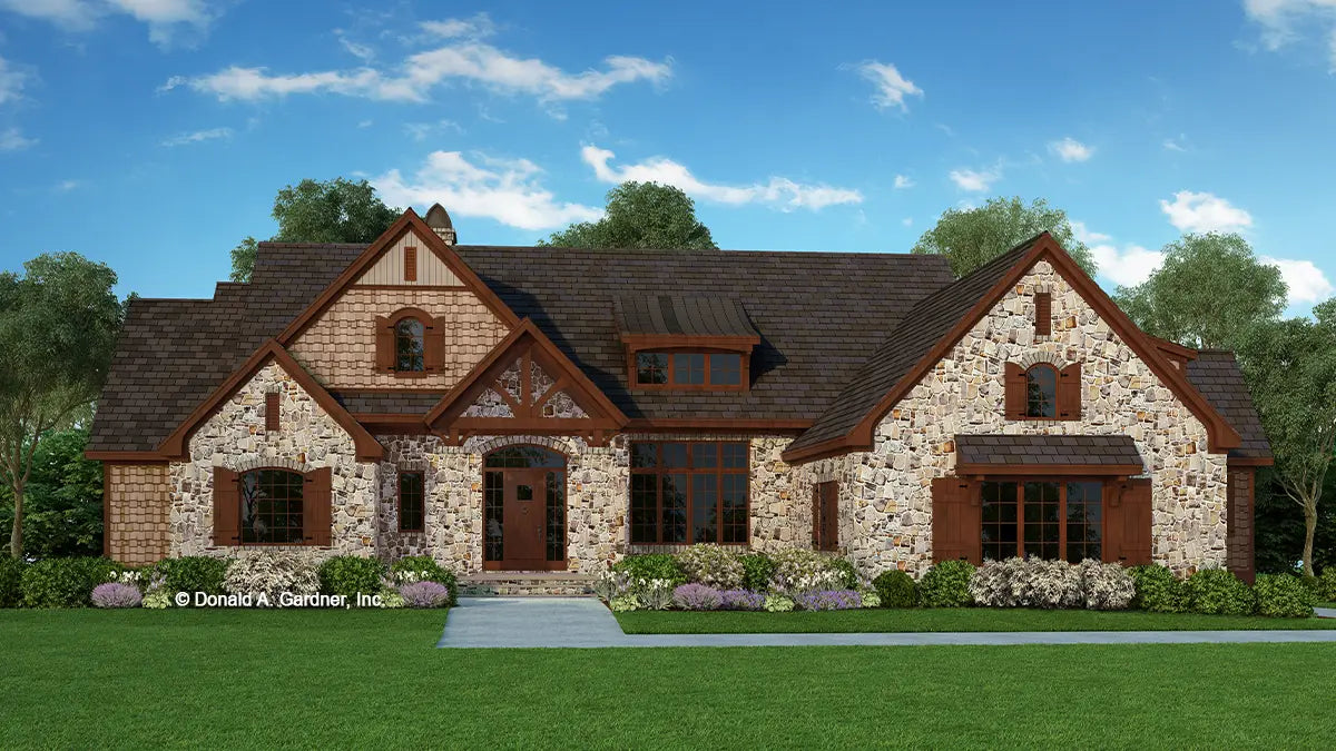 Front view stone and cedar craftsman style home. The Sycamore Hall plan 5000.