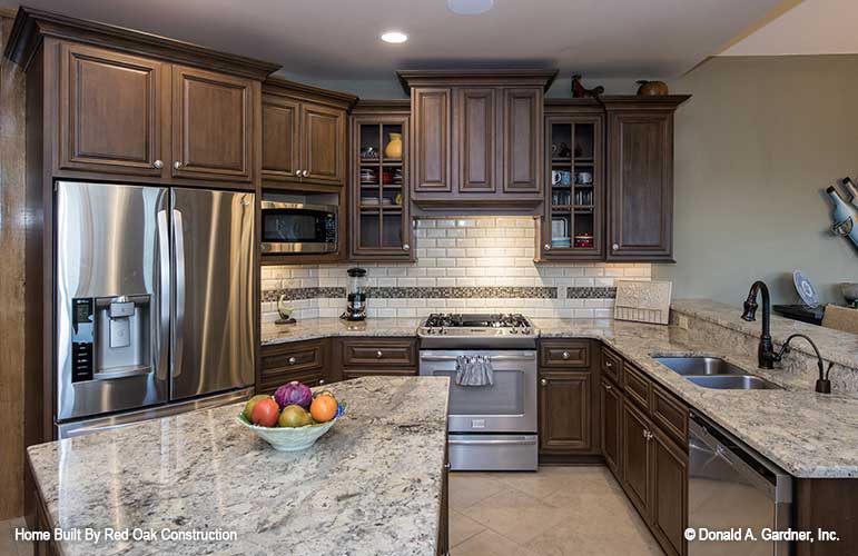 Stainless-steel appliances in the kitchen. The Sylvan plan 1321.