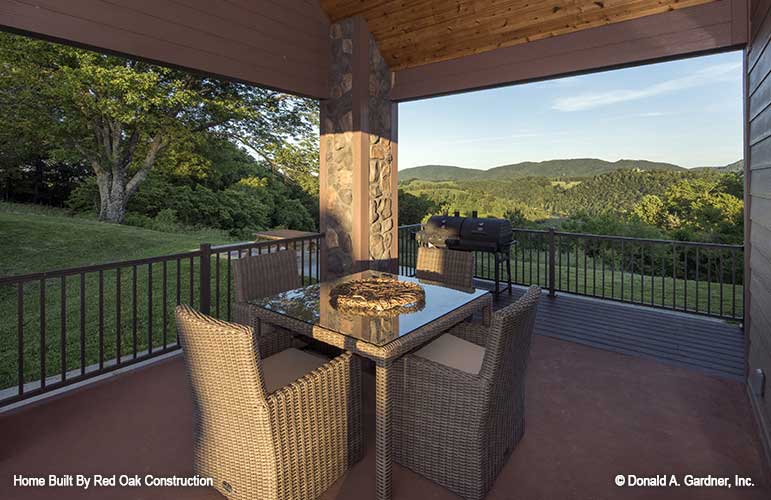 Sitting area in the rear covered porch. The Sylvan plan 1321.