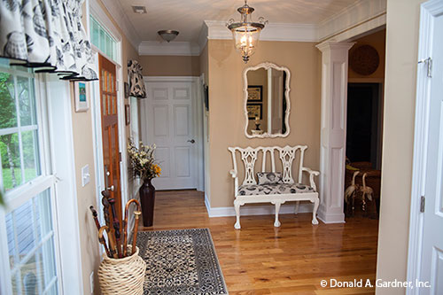 Crown molding along the ceiling in the foyer. The Tamassee plan 333.