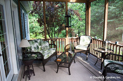 Sitting area in the screened in porch. The Tamassee plan 333.