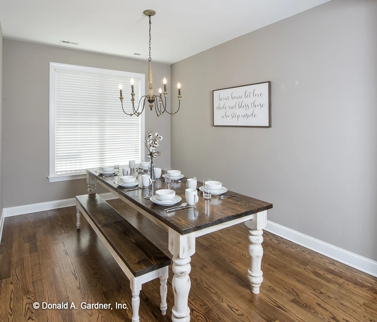 An open dining room gives space for both formal and casual dining for small house plan 757 The Tanglewood