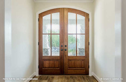 Inviting view of the foyer with double front doors. Tanner plan 1418