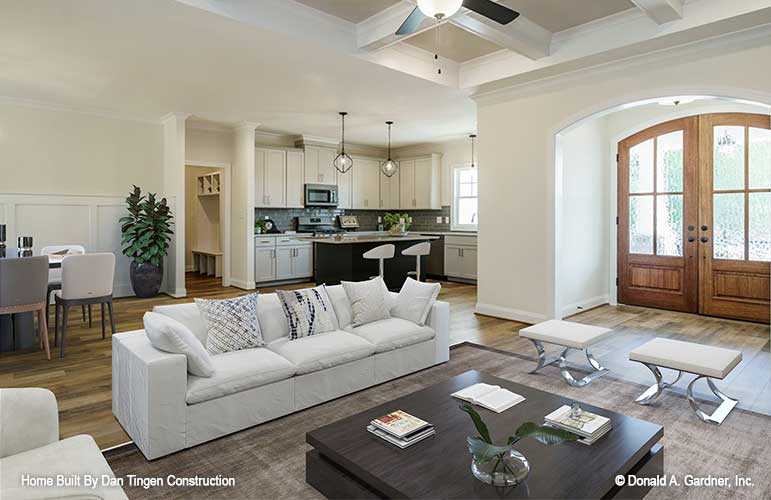 Side view of the foyer from the great room with the kitchen off in the back view. Tanner plan 1418