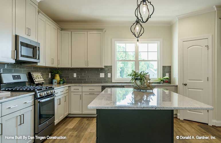 Gorgeous side view of the kitchen island. Tanner plan 1418