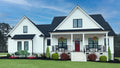 This is a photograph of the front of Modern Farmhouse house plan 1497 The Thomasina as built by a customer