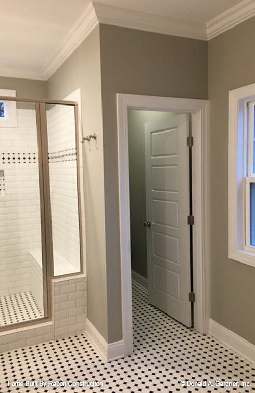 Crown molding along the ceiling in the master bathroom. The Topeka plan 1000.