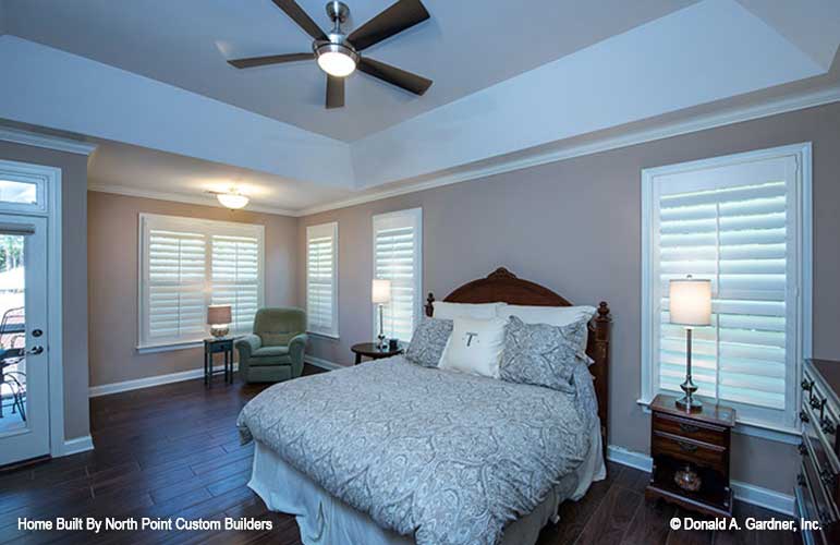 Tray ceiling and ceiling fan in the master bedroom. The Travis plan 1350.