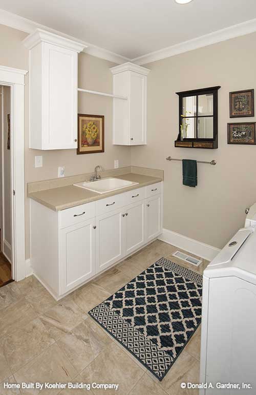 Sink and cabinets in the utility room. The Tristan plan 1311.