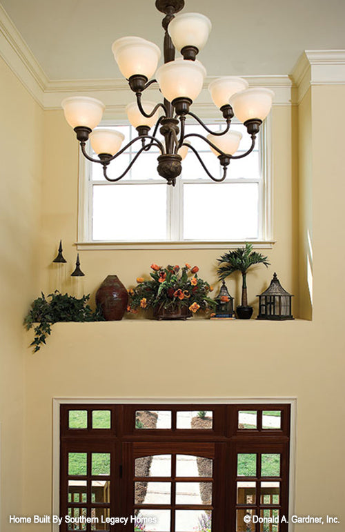 Chandelier and ledge in the foyer. The Trotterville plan 984.