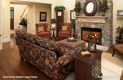 Stone fireplace in the great room. The Trotterville plan 984.