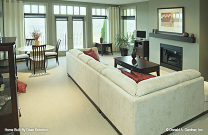 This is a full family room picture of walkout basement house plan 746 The Vandenberg