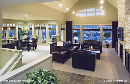 This picture shows the great room and dining area of walkout basement house plan 746 The Vandenberg