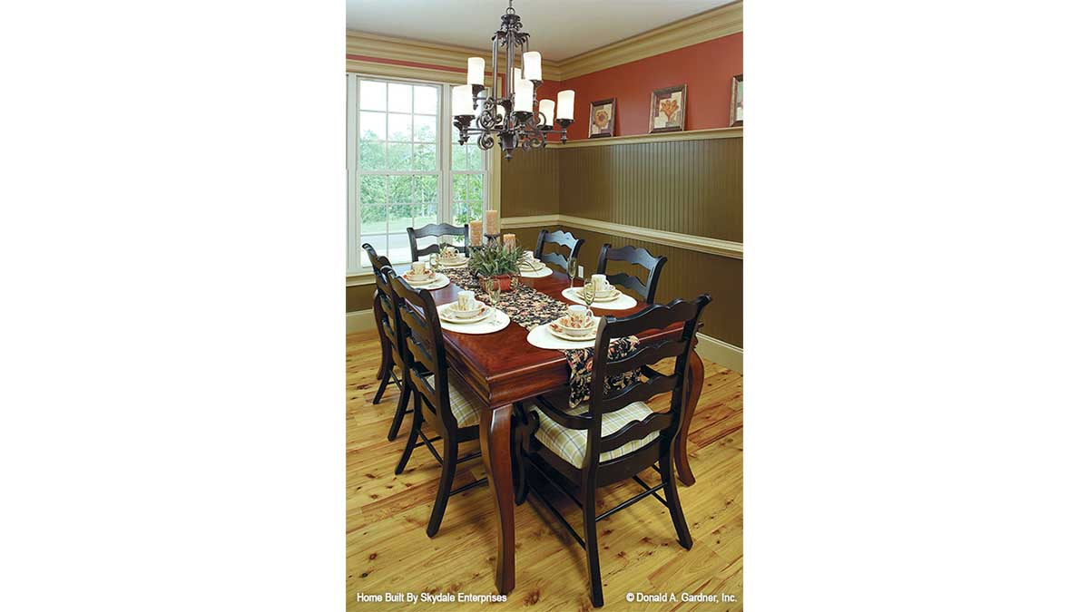 This is a photograph of the dining room of european house plan 936 The Verdigre as built by a customer