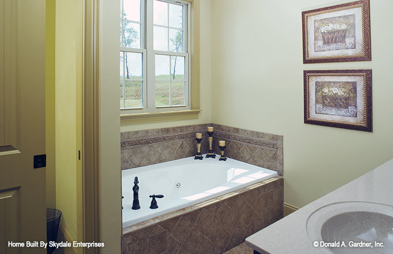 This is a photograph of the master bath of european house plan 936 The Verdigre as built by a customer