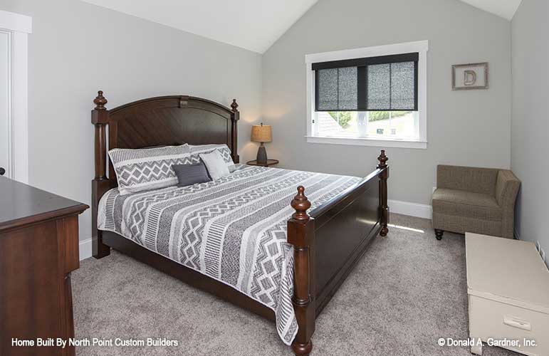 This is a photograph of a bedroom of craftsman house plan 1446 The Wallace as built by a customer