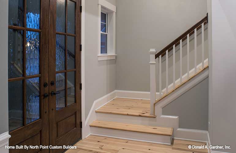 This is a photograph of the foyer of craftsman house plan 1446 The Wallace as built by a customer