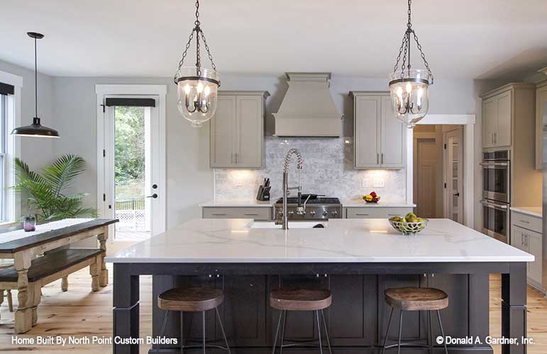 This is a photograph of the kitchen island of craftsman house plan 1446 The Wallace as built by a customer