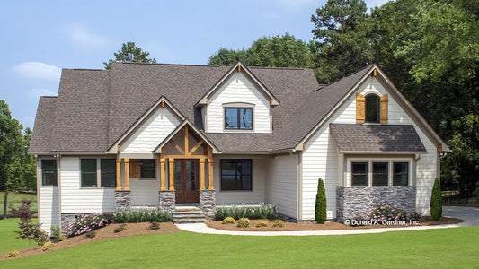 This is a photograph of the front of rustic house plan 1446 The Wallace as built by a customer