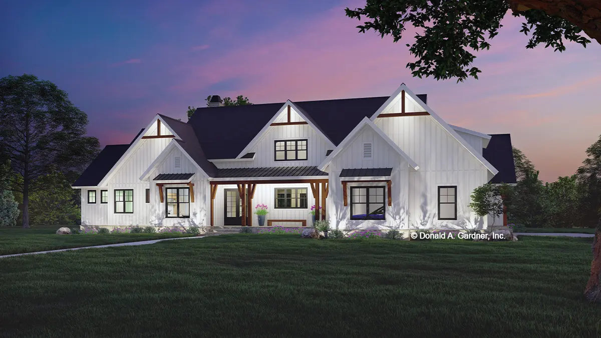 This is an illustration of the front of modern farmhouse plan 1551 The Watson at dusk