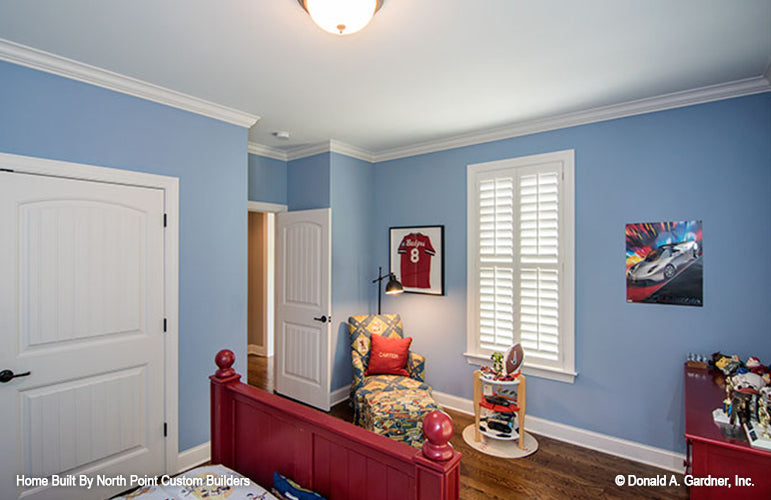 Secondary bedroom with crown molding ceiling. The Weatherford plan 1053.