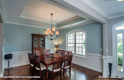 Wainscotting and arched window in the dining room. The Weatherford plan 1053.